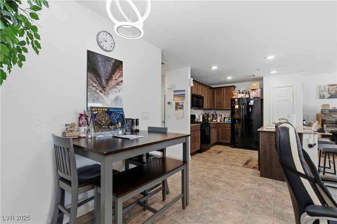 4648 Woolcomber Street Las Vegas, NV 89115 - Photo 7 of 41 Dining space featuring recessed lighting