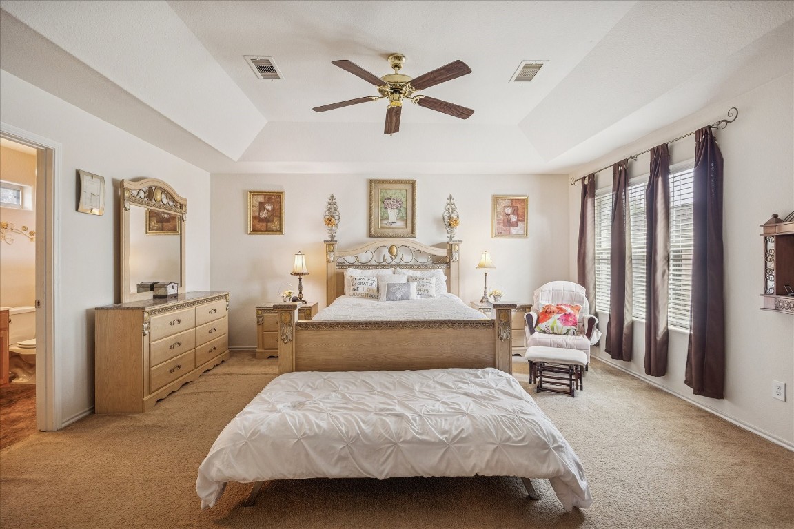 12811 Rio Lindo Street Rosharon, TX 77583 - Photo 6 of 13 a bedroom with a bed and wooden floor