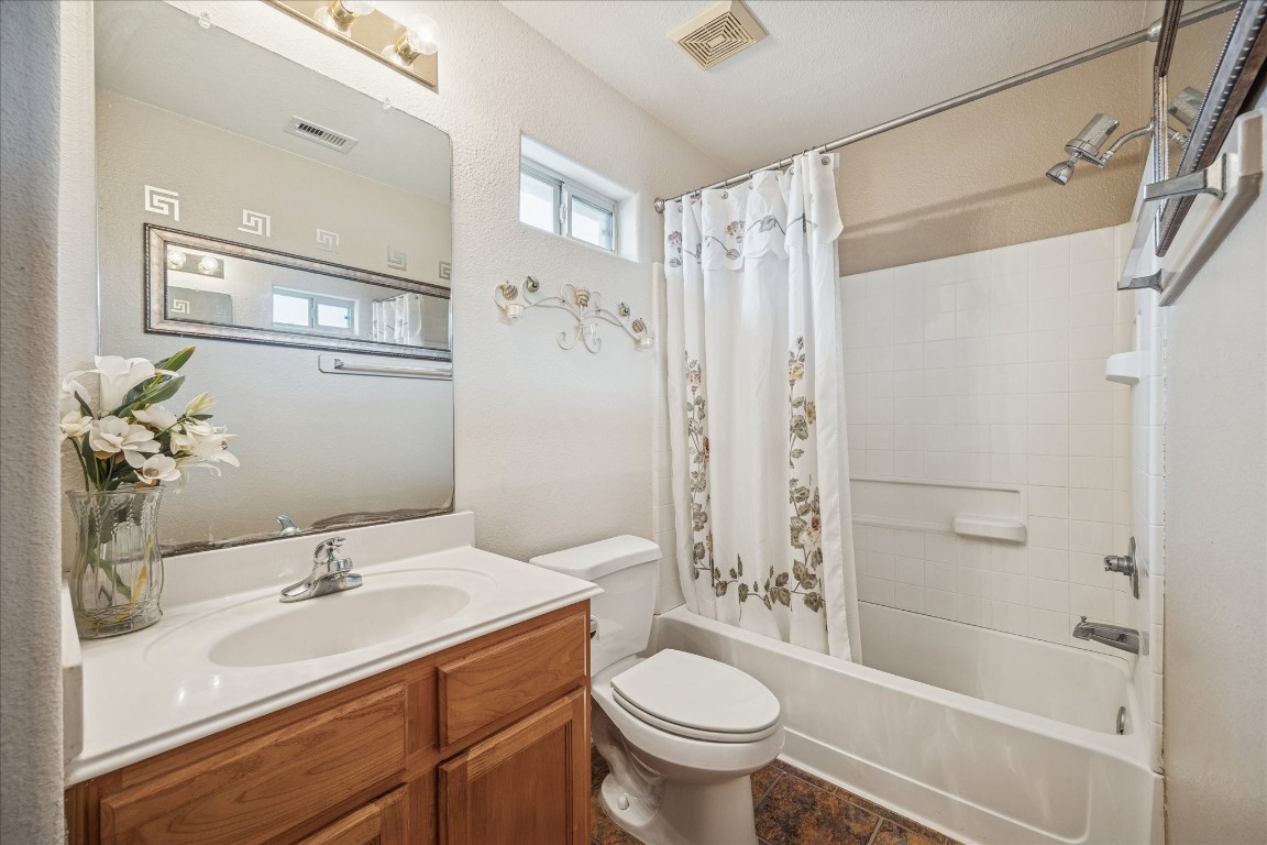 12811 Rio Lindo Street Rosharon, TX 77583 - Photo 7 of 13 a bathroom with a sink toilet and shower