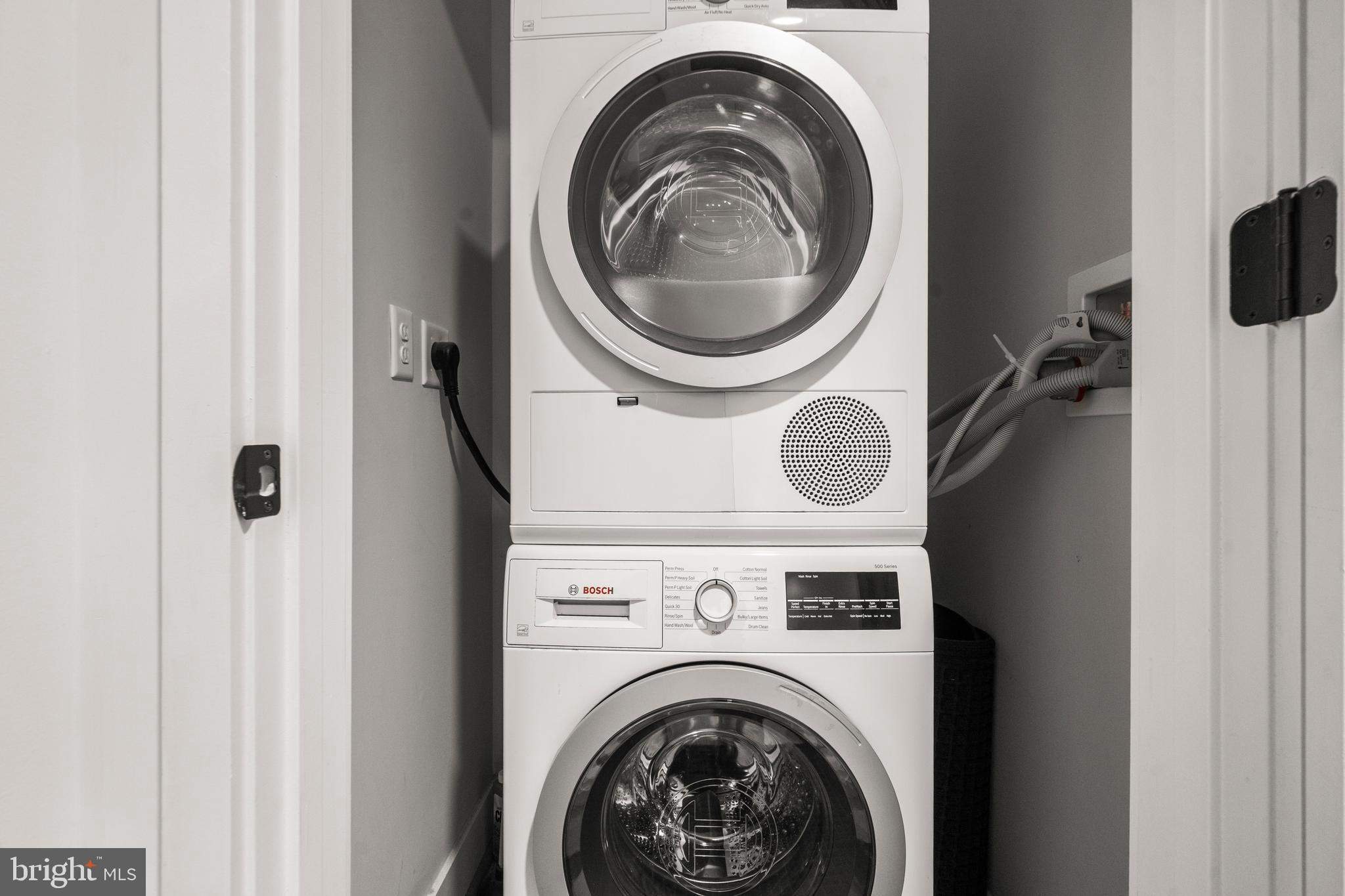 1300 4th Street Southeast, Unit 312 Washington, DC 20003 - Photo 21 of 39 a utility room with dryer and washer