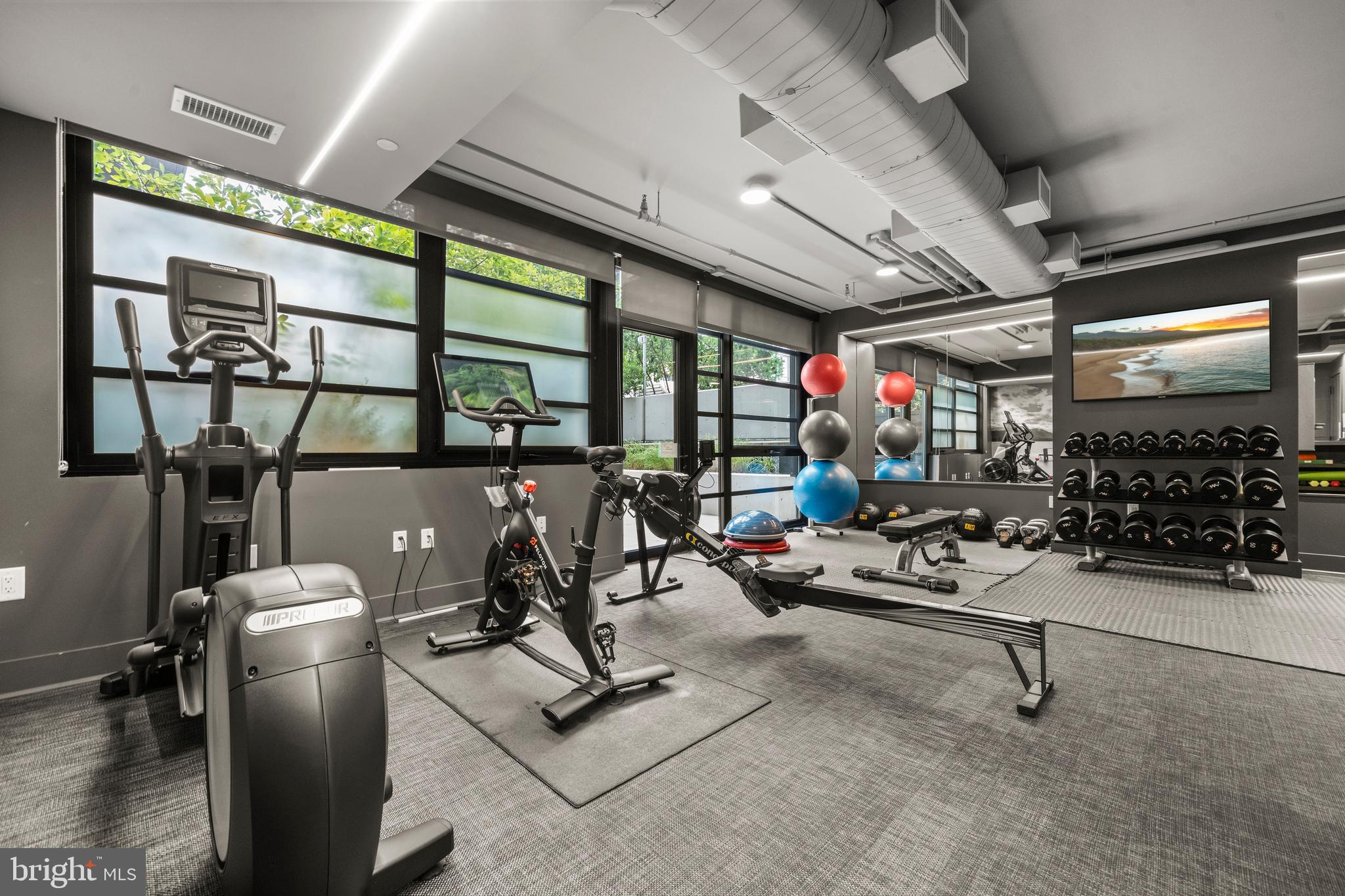 1300 4th Street Southeast, Unit 312 Washington, DC 20003 - Photo 31 of 39 a view of a room with gym equipment