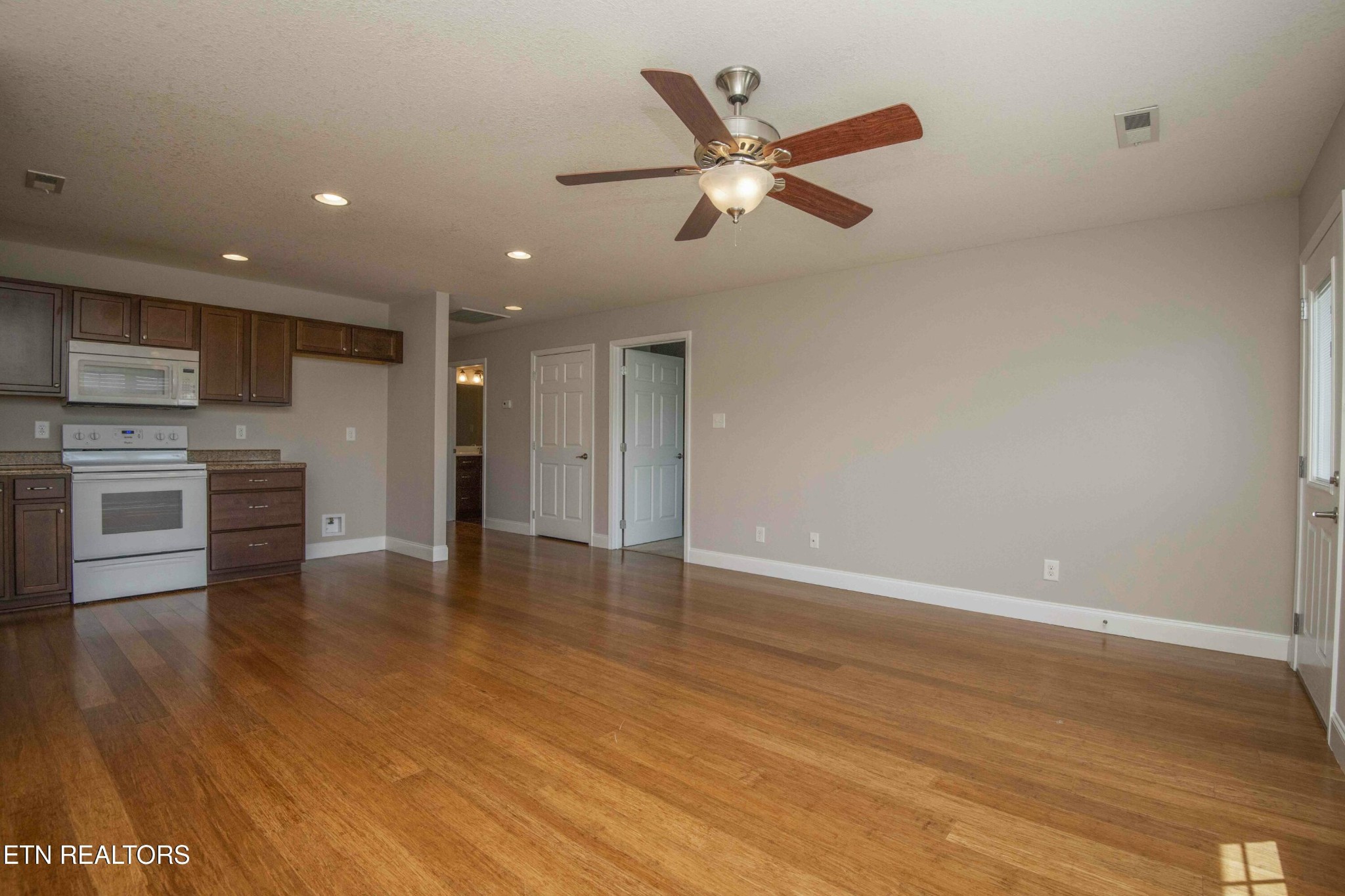337 Angus Crossing Corryton, TN 37721 - Photo 14 of 36 a view of a kitchen with a sink and a stove