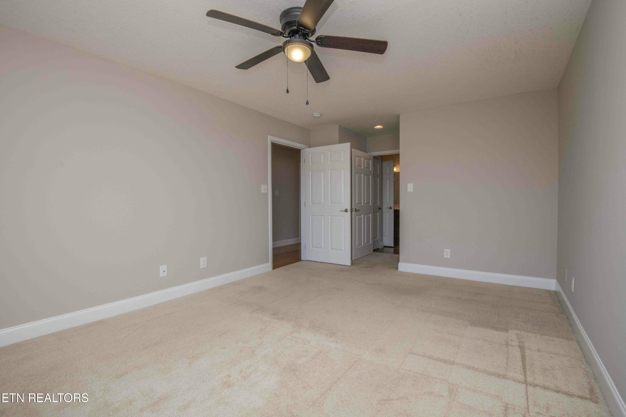 337 Angus Crossing Corryton, TN 37721 - Photo 17 of 36 a view of an empty room and chandelier fan