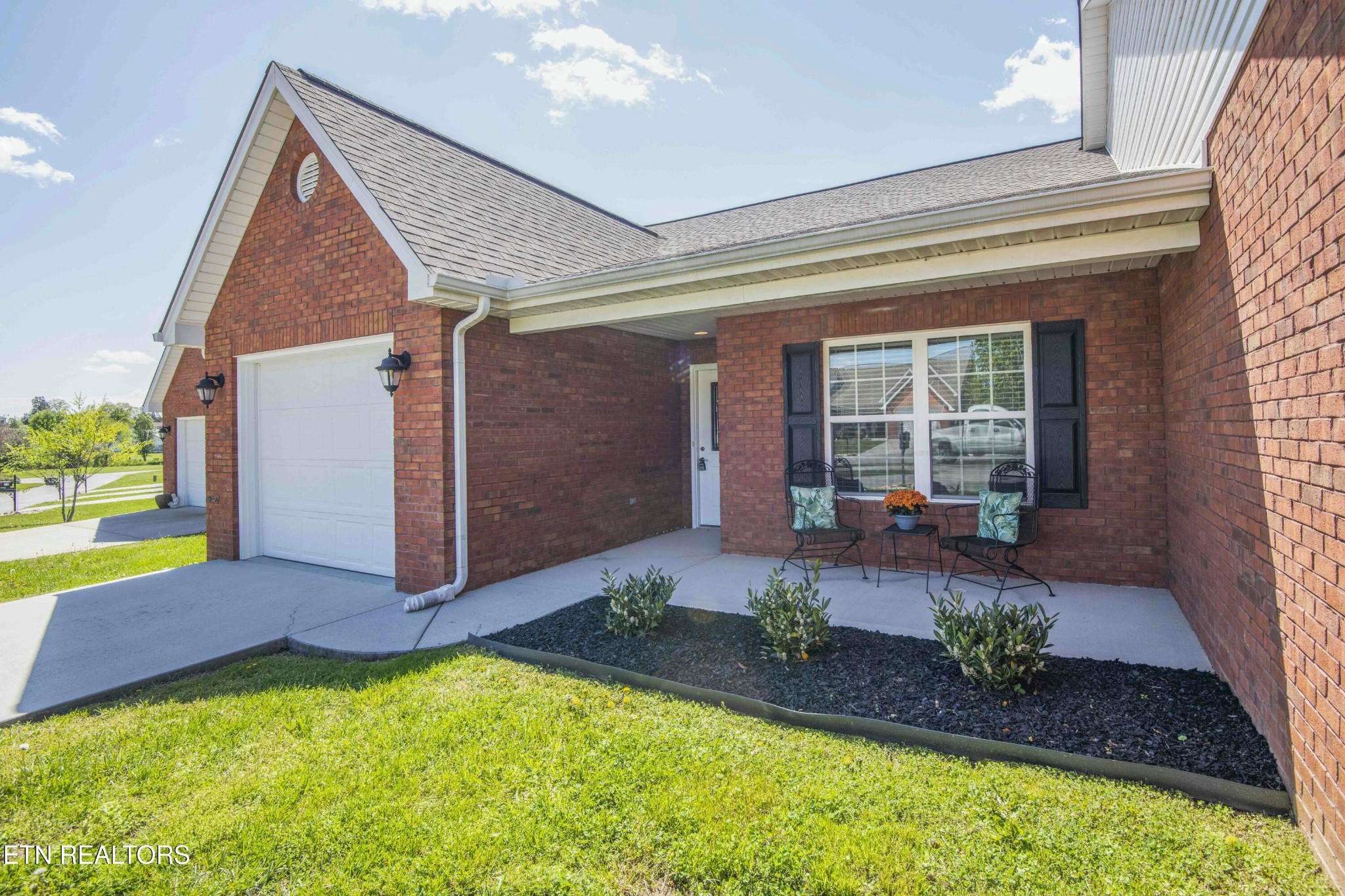 337 Angus Crossing Corryton, TN 37721 - Photo 2 of 36 a front view of a house with garden