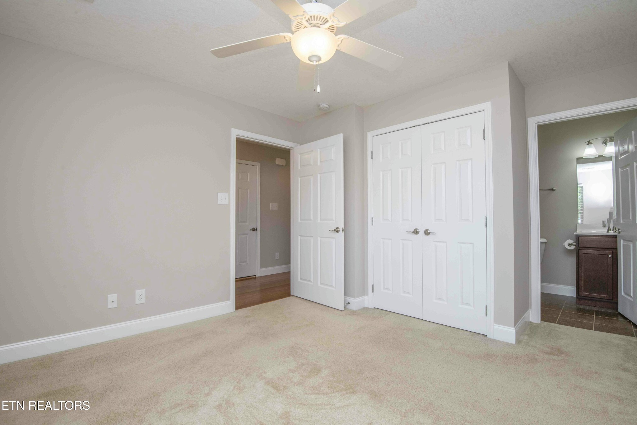 337 Angus Crossing Corryton, TN 37721 - Photo 23 of 36 an empty room with fan and entrance