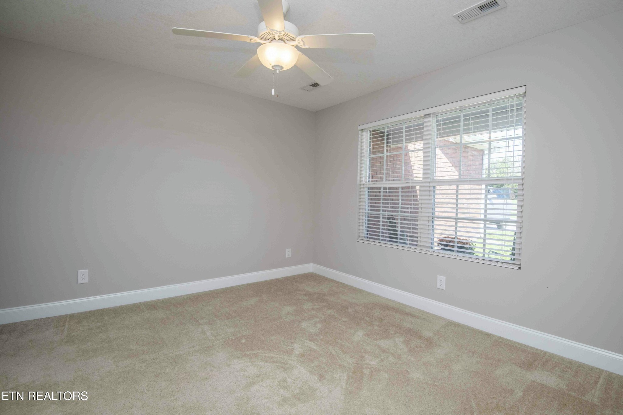 337 Angus Crossing Corryton, TN 37721 - Photo 24 of 36 a view of an empty room with a window
