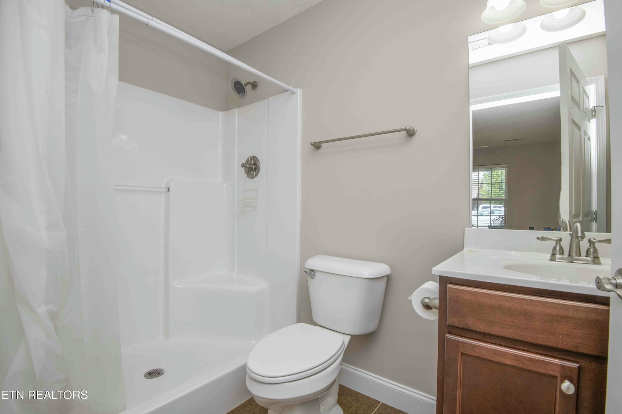 337 Angus Crossing Corryton, TN 37721 - Photo 27 of 36 a bathroom with a sink toilet and shower