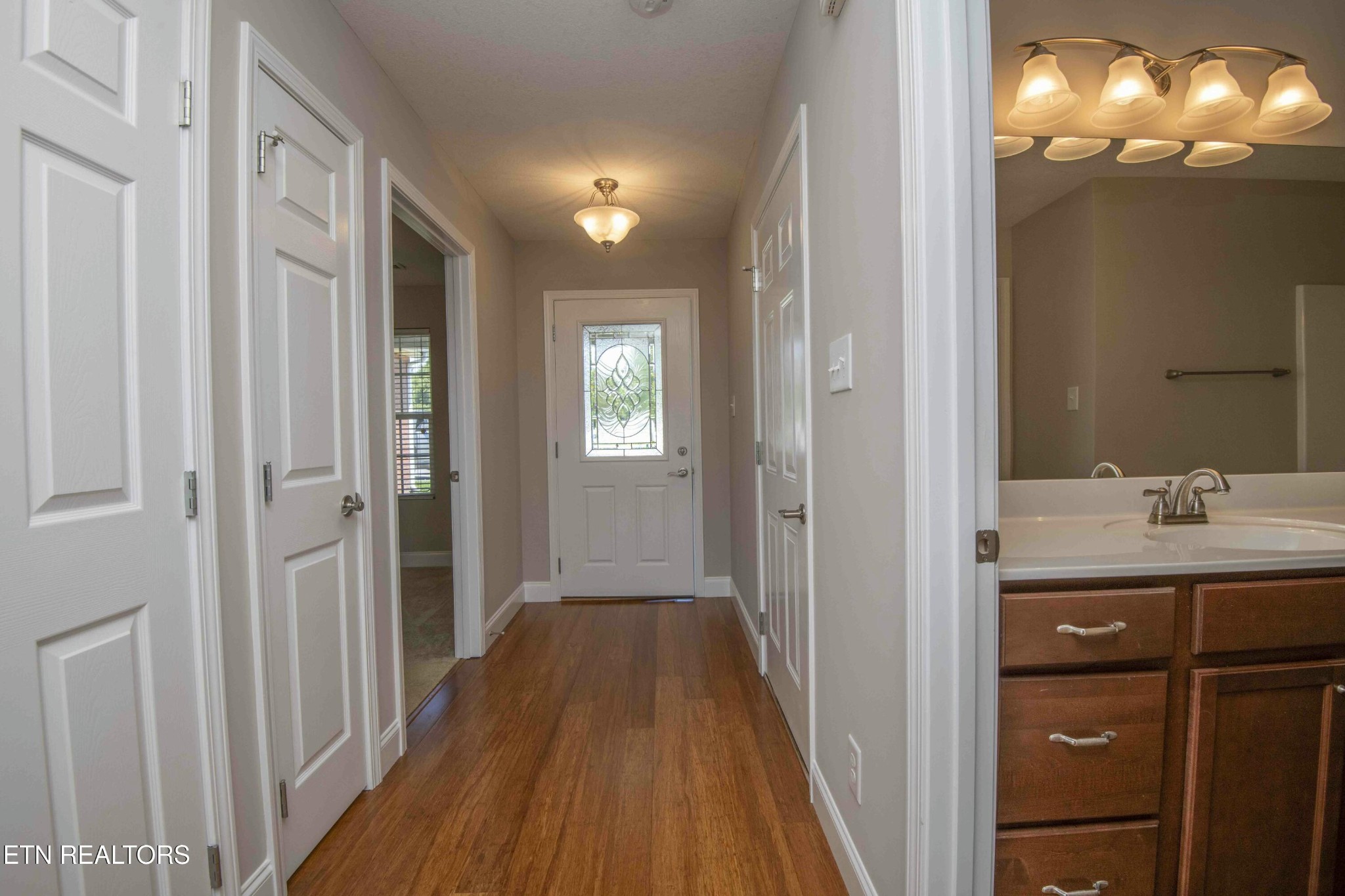 337 Angus Crossing Corryton, TN 37721 - Photo 28 of 36 a bathroom with a sink and mirror