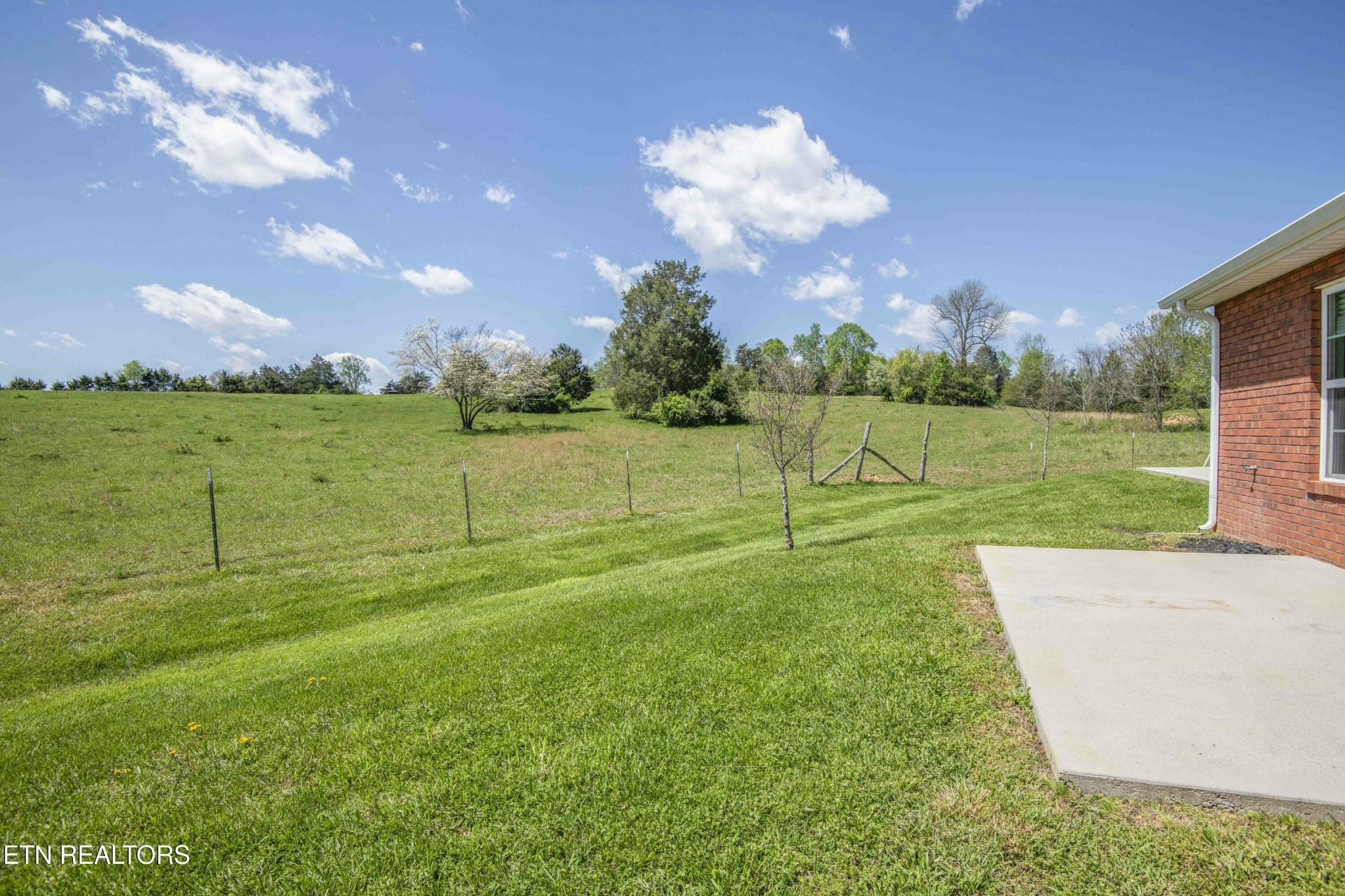 337 Angus Crossing Corryton, TN 37721 - Photo 30 of 36 a view of a golf course with a lake