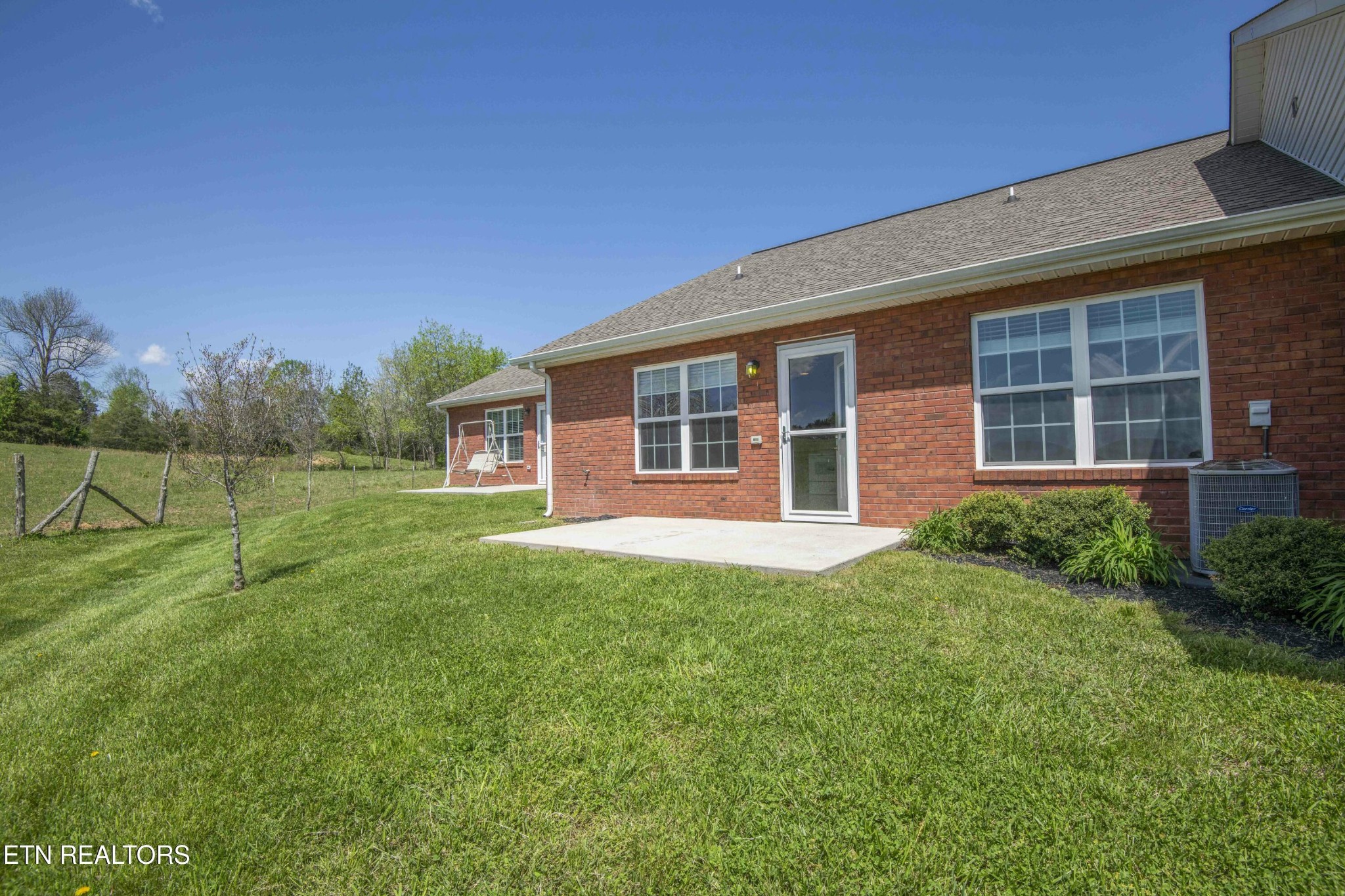 337 Angus Crossing Corryton, TN 37721 - Photo 31 of 36 a view of a house with backyard and porch