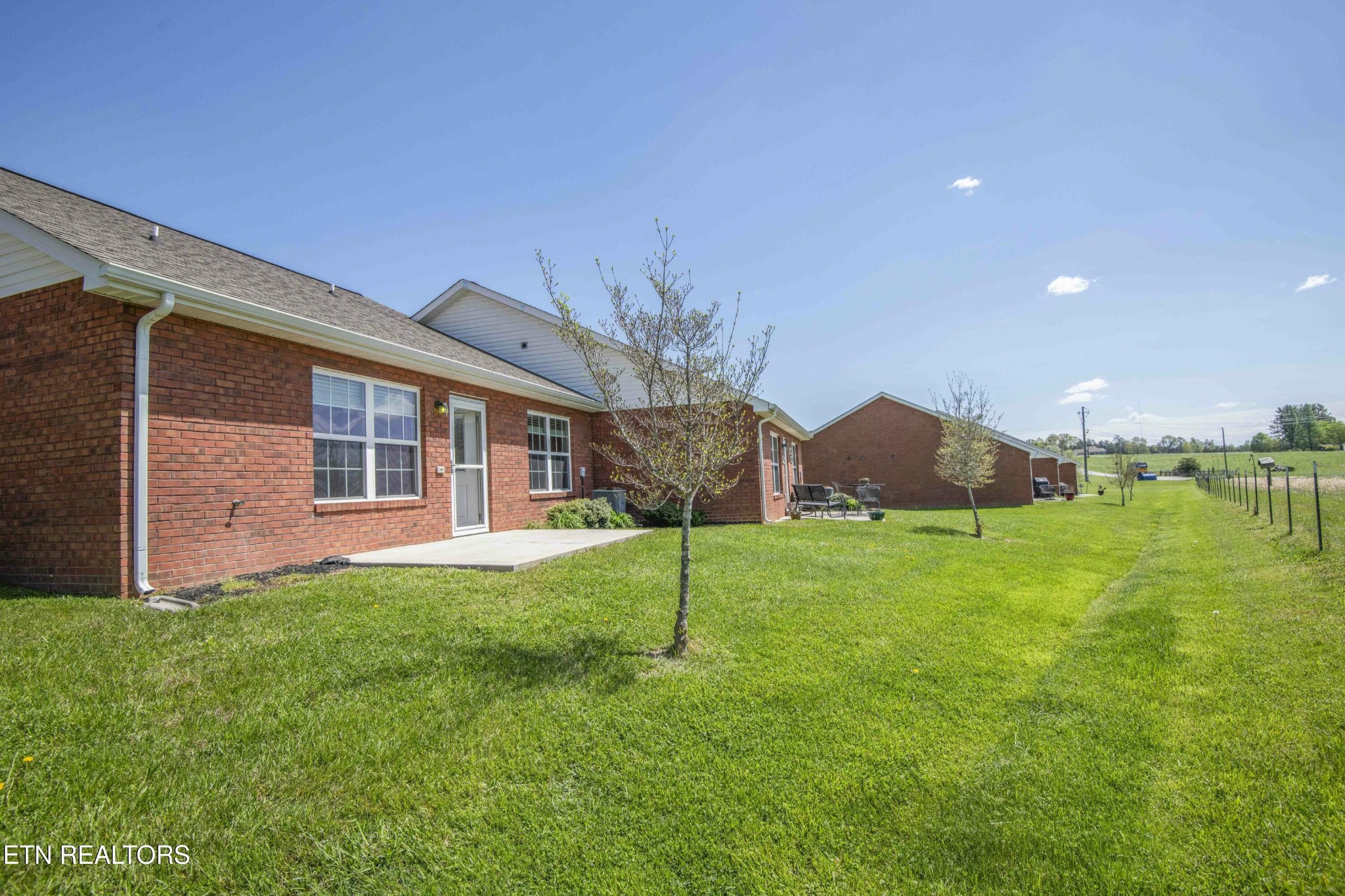 337 Angus Crossing Corryton, TN 37721 - Photo 33 of 36 a view of a house with a yard and a porch