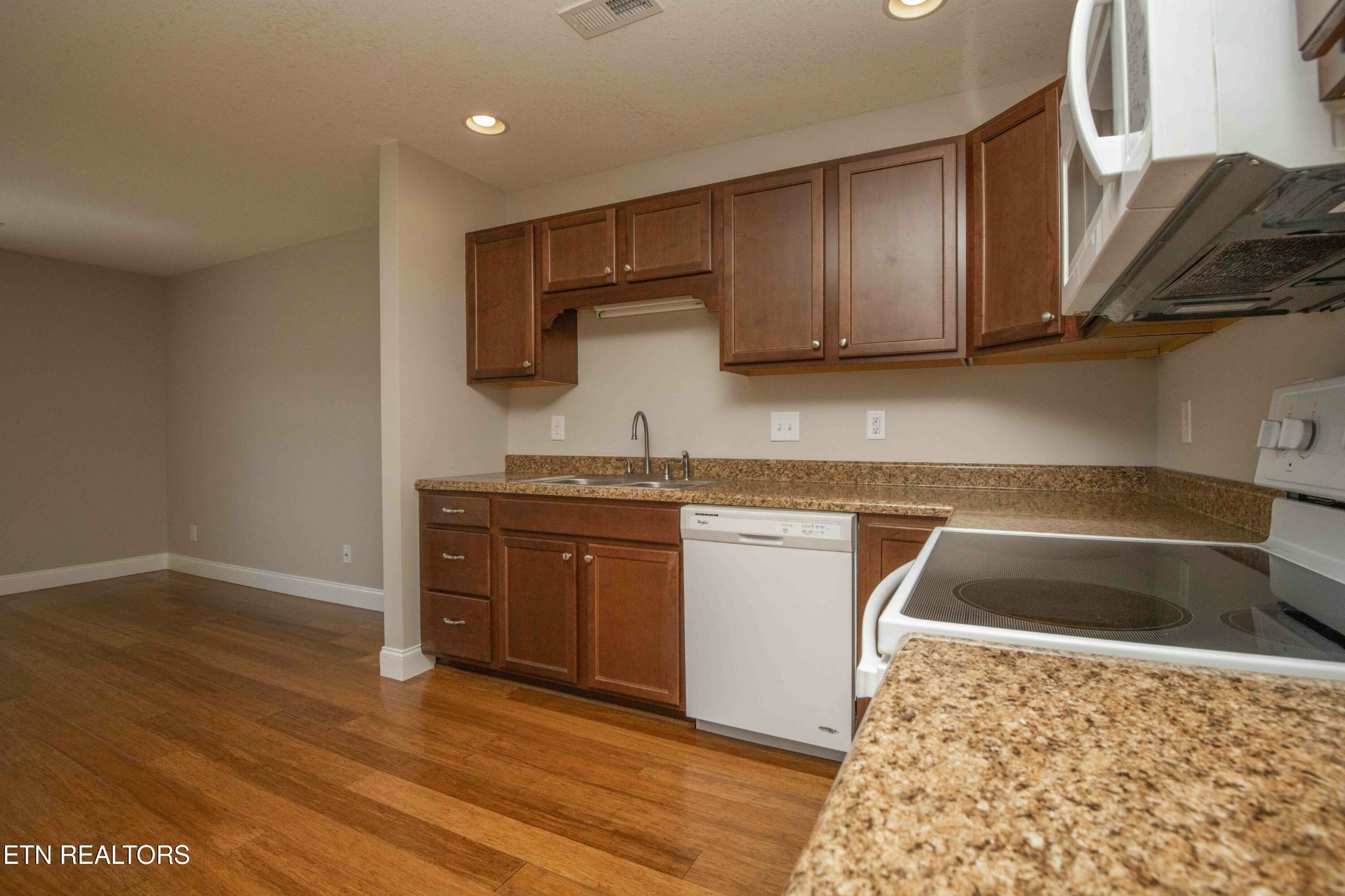 337 Angus Crossing Corryton, TN 37721 - Photo 8 of 36 a kitchen with a sink and cabinets