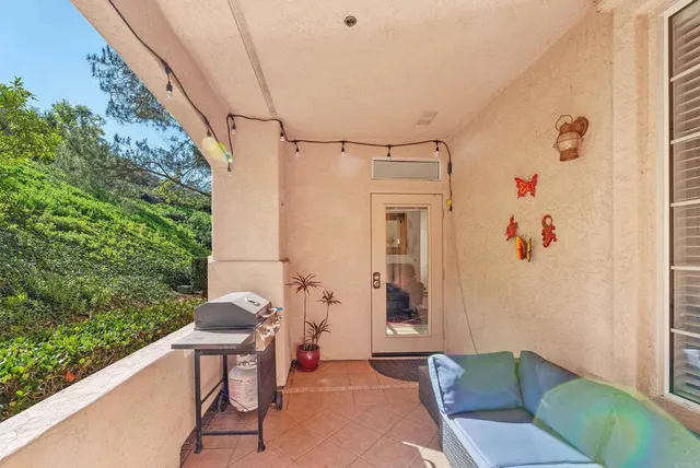 a view of a table and chairs in patio