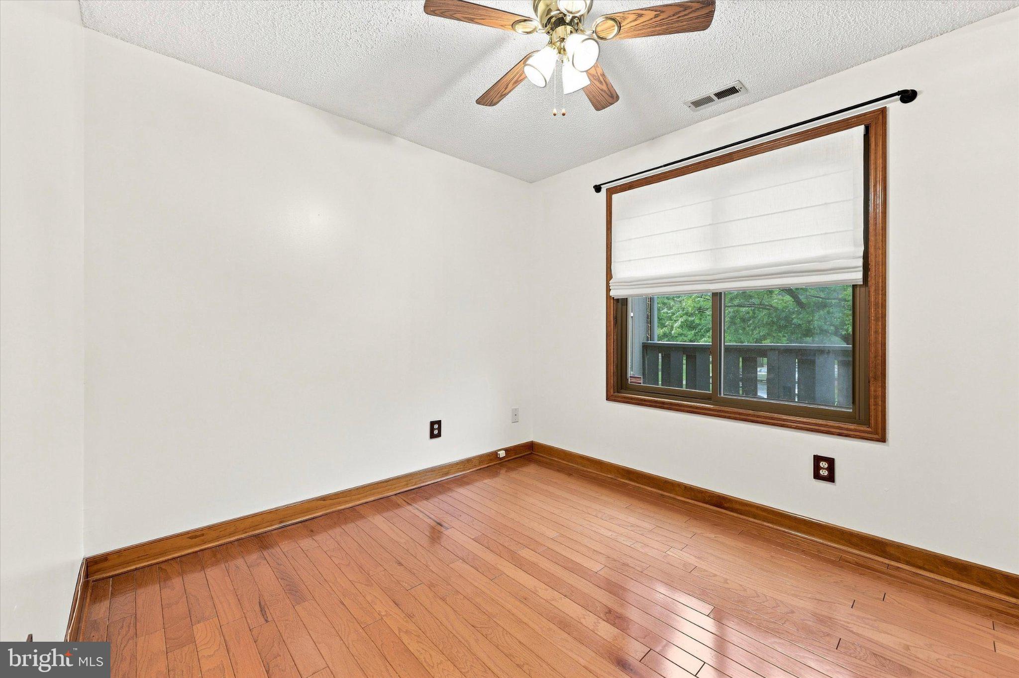 4703 B Dunbarton Road Mount Laurel, NJ 08054 - Photo 12 of 25 Bright and airy bedroom with hardwood floors.