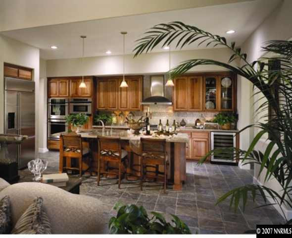 8597 Timaru Trail Reno, NV 89523 - Photo 4 of 7 a group of chairs sitting in kitchen and dining room