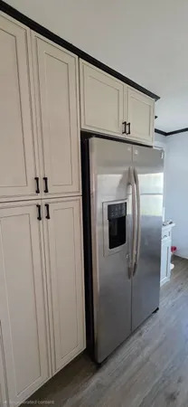 a close view of a refrigerator in kitchen