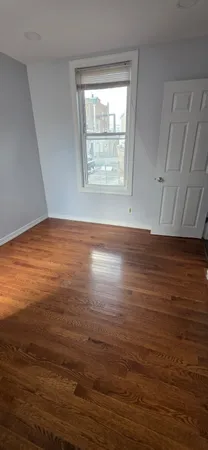 a view of an ocean & window in a room