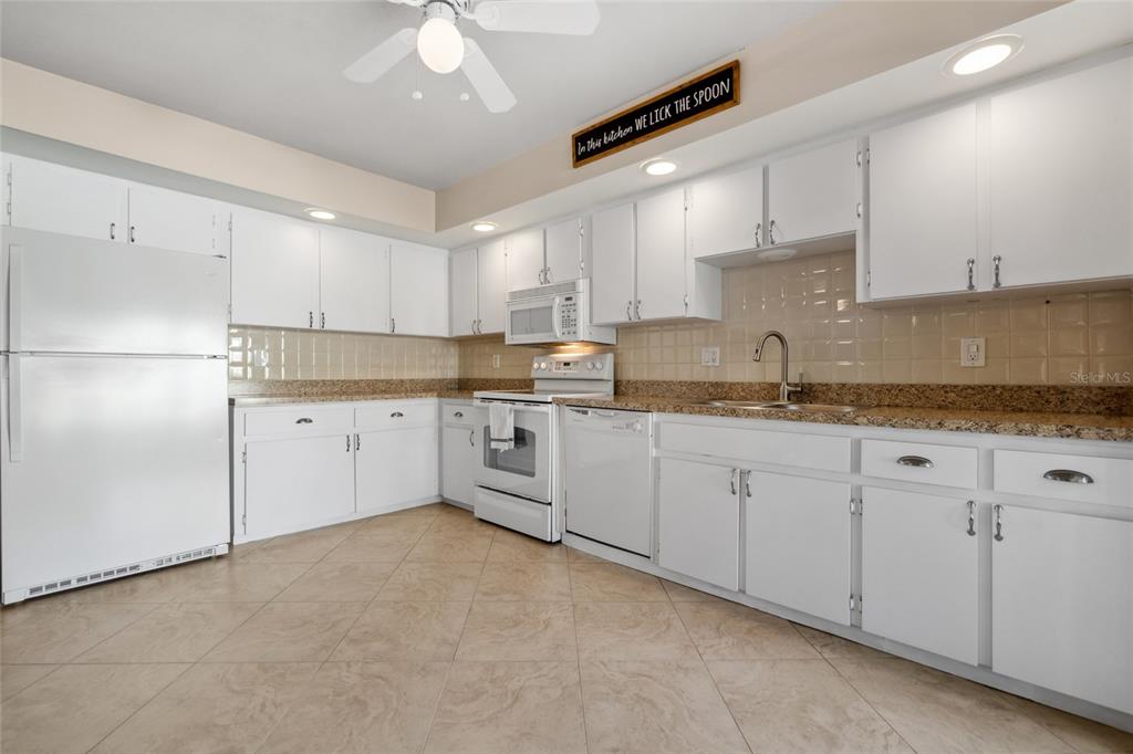 2101 Sunset Point Road, Unit 1102 Clearwater, FL 33765 - Photo 9 of 27 Loads of cabinet space