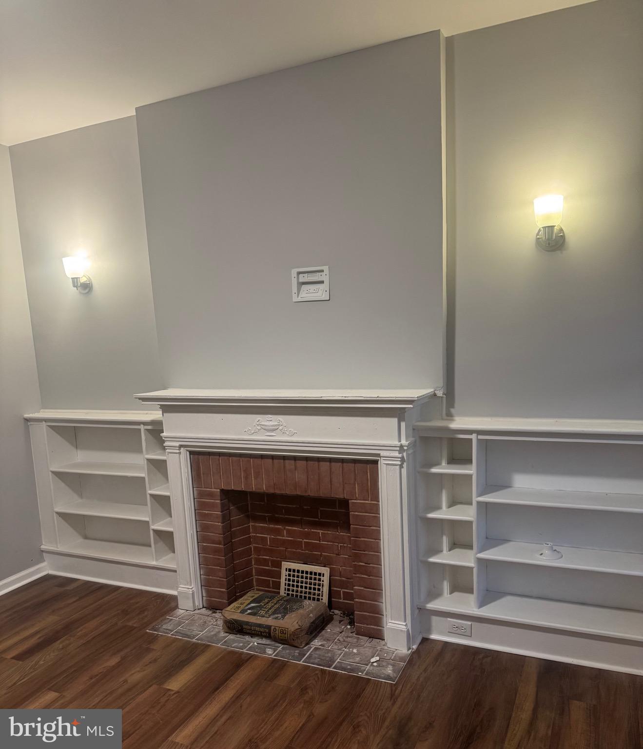 2732 Riggs Avenue Baltimore, MD 21216 - Photo 5 of 23 a view of a livingroom with a fireplace
