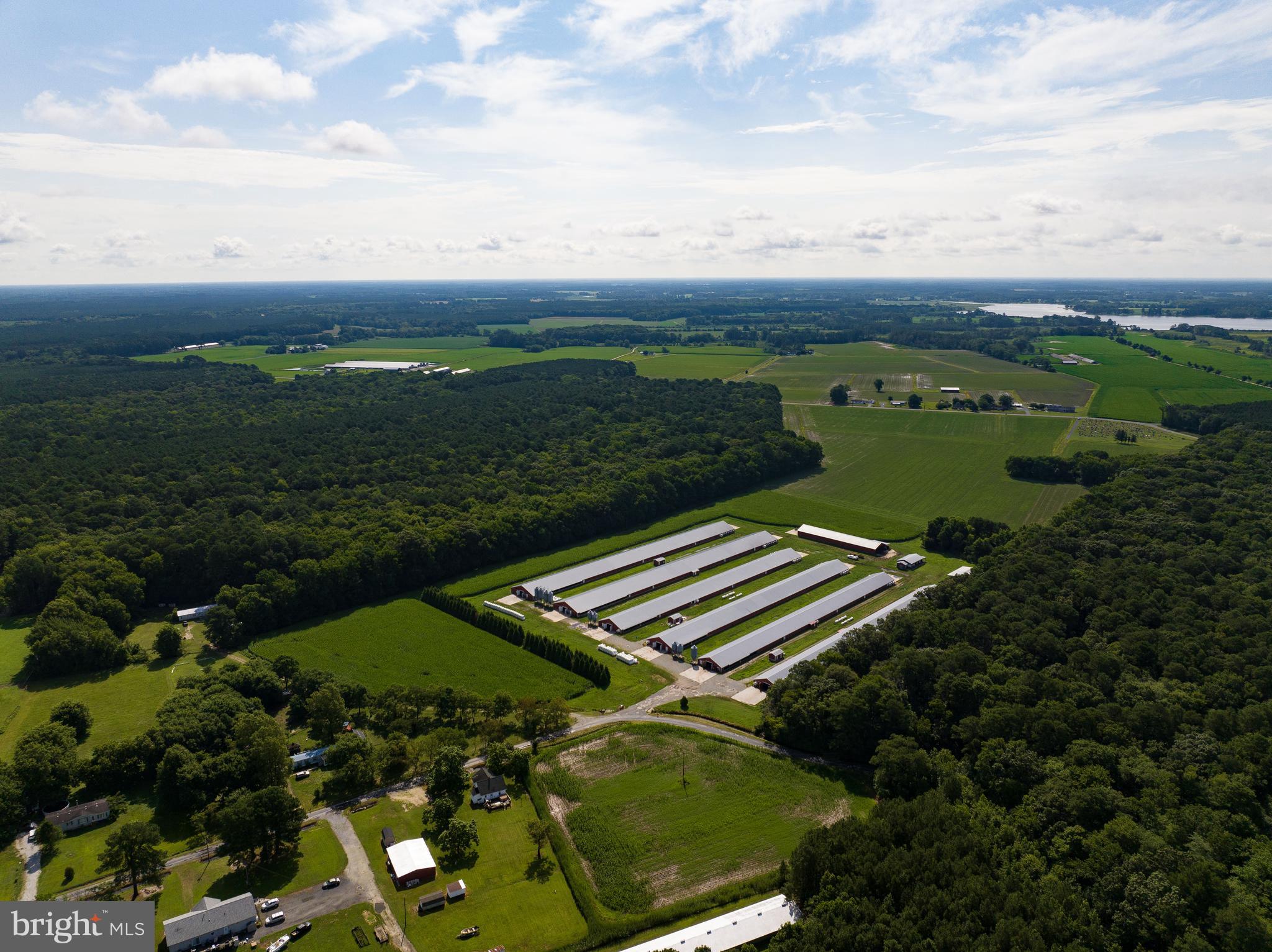 27590 Oriole Road Princess Anne, MD 21853 - Photo 7 of 12 an aerial view of a golf course with parking space