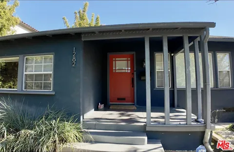 a view of house with outdoor space