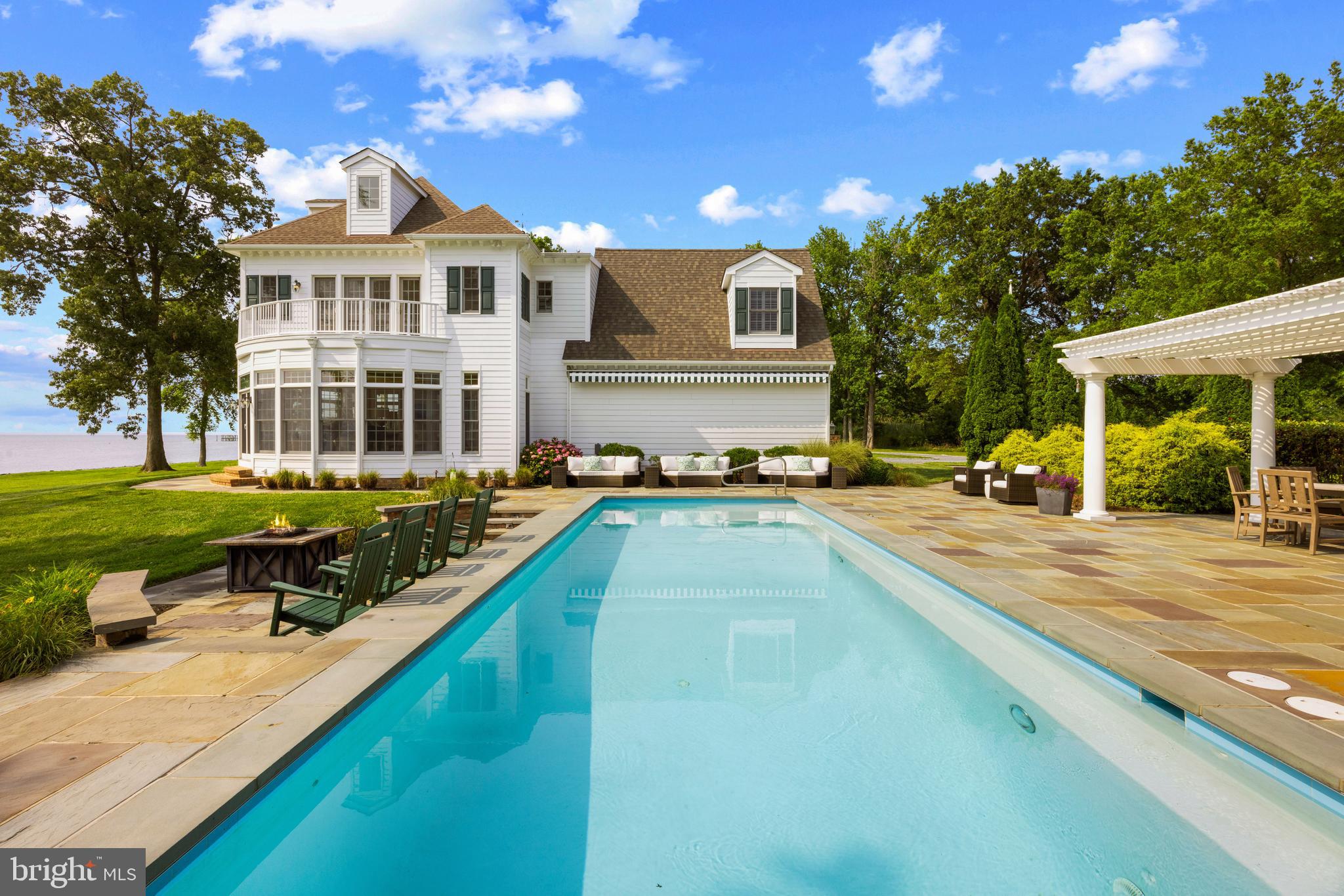 7680 Kent Point Road Stevensville, MD 21666 - Photo 12 of 22 a view of a house with swimming pool