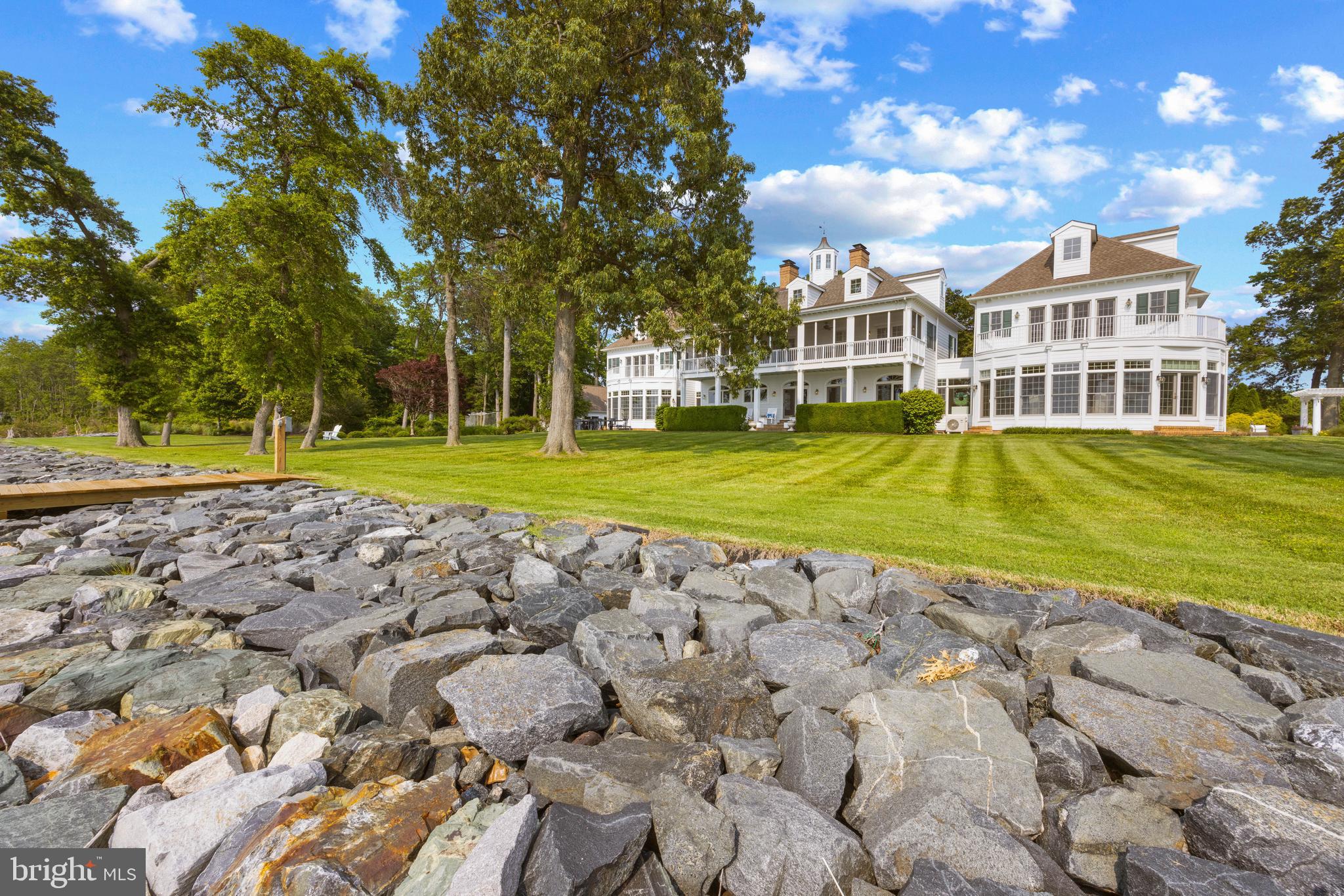 7680 Kent Point Road Stevensville, MD 21666 - Photo 14 of 22 a view of yard with swimming pool and green space