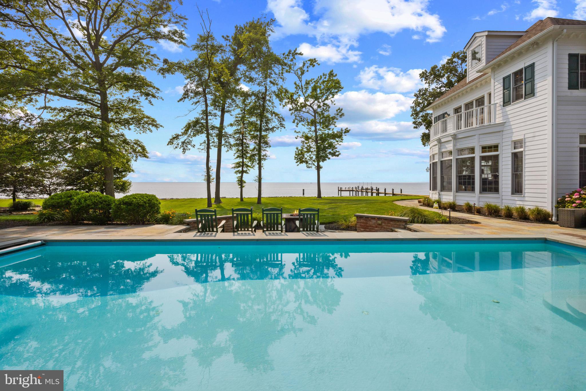 7680 Kent Point Road Stevensville, MD 21666 - Photo 4 of 22 Gorgeous pool overlooking lawn and Chesapeake Bay