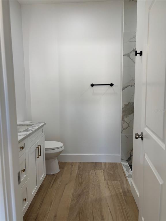 317 Quail Avenue Sebring, FL 33870 - Photo 13 of 19 a bathroom with a toilet and a shower