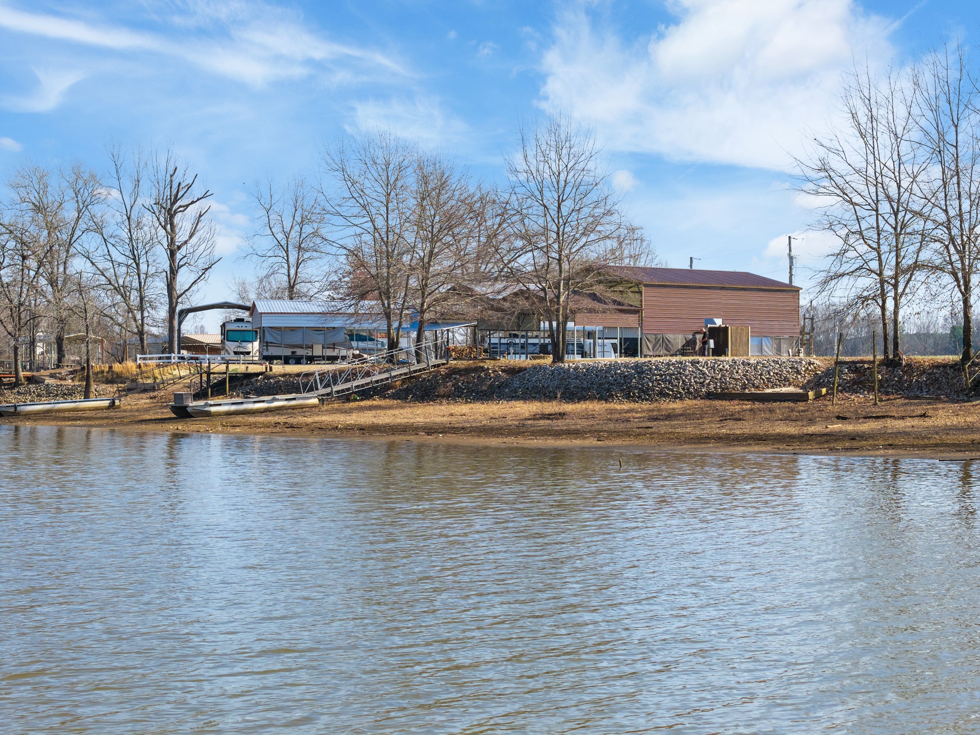 0 Ds Cove Decaturville, TN 38329 - Photo 12 of 60 a view of a lake with houses