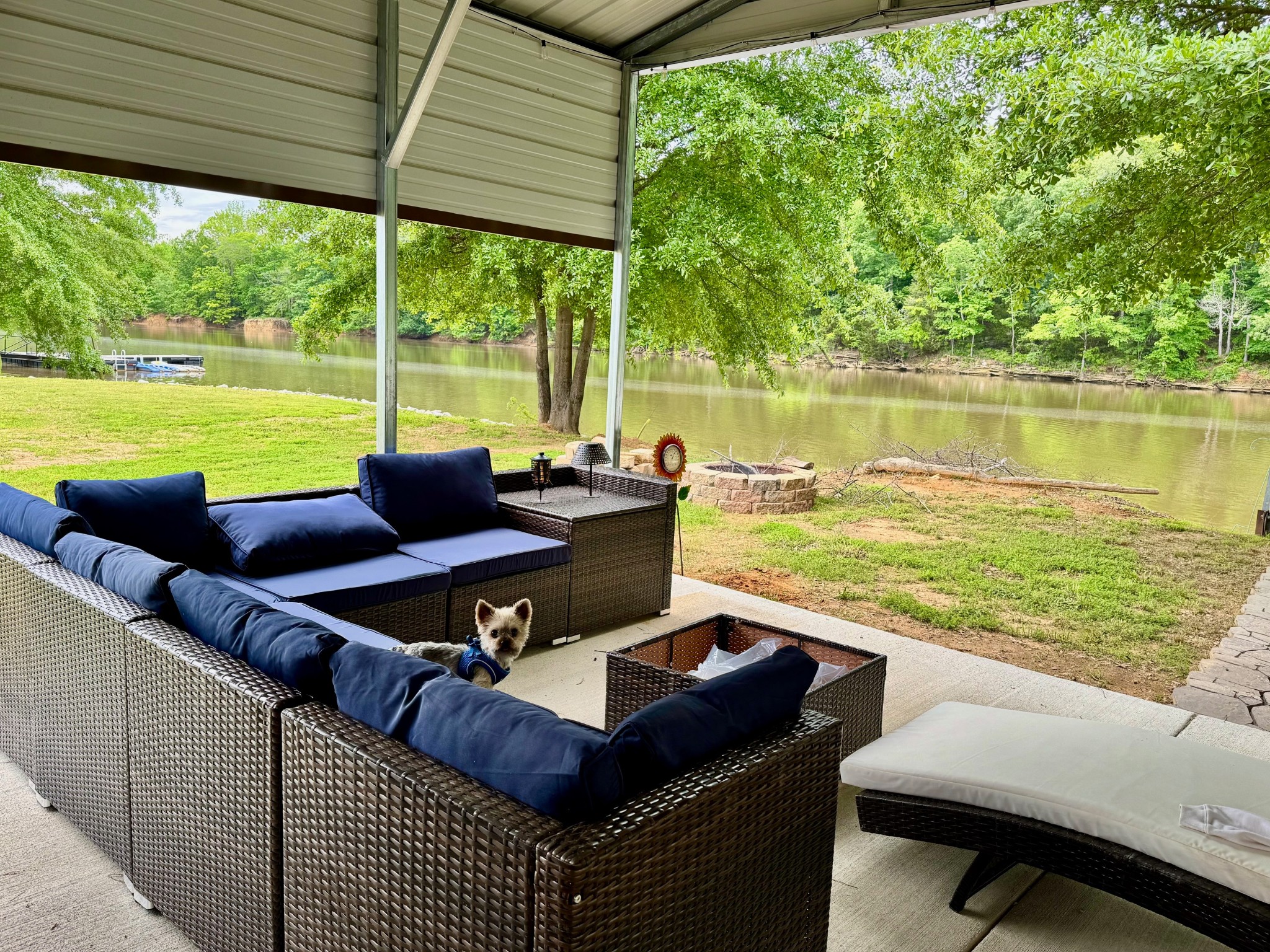 0 Ds Cove Decaturville, TN 38329 - Photo 51 of 60 a view of a patio with lawn chairs under an umbrella