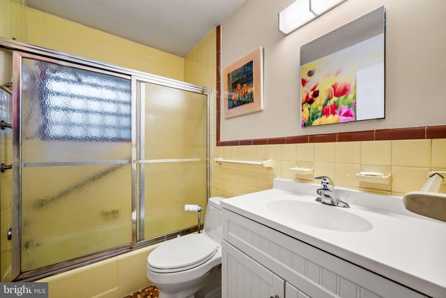 a view of front door with outdoor seating