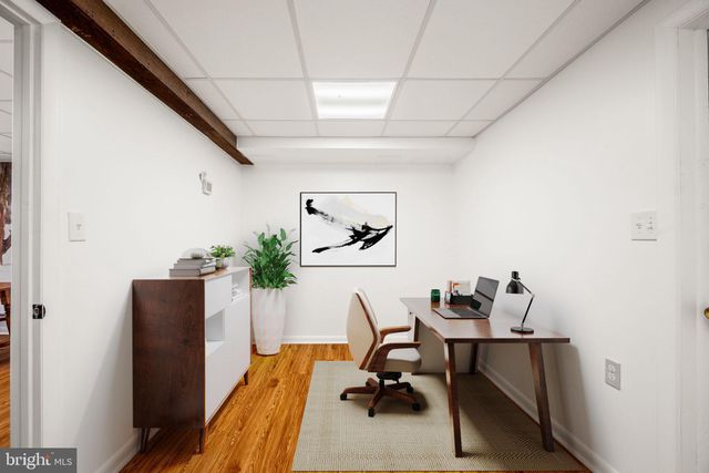 a bed room with a bed and a chair