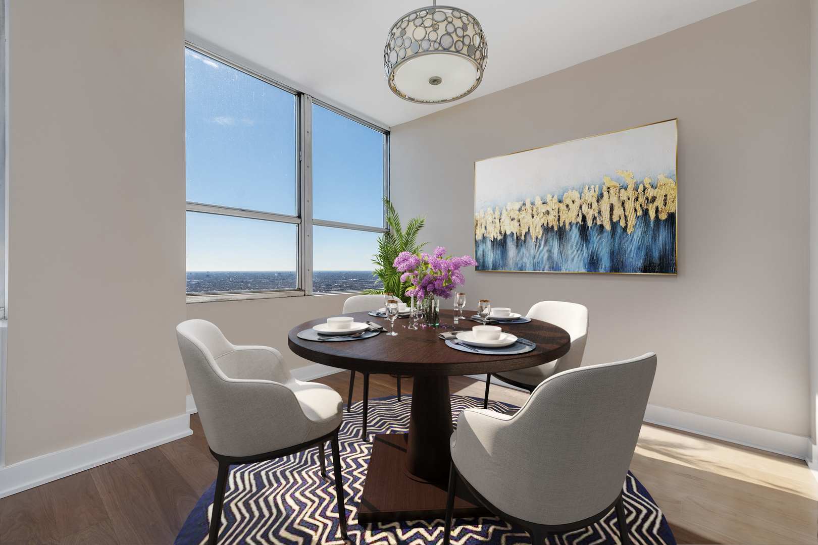 655 West Irving Park Road, Unit 5103 Chicago, IL 60613 - Photo 12 of 30 a view of a dining room with furniture and a potted plant