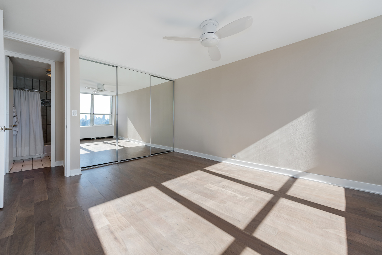 655 West Irving Park Road, Unit 5103 Chicago, IL 60613 - Photo 17 of 30 wooden floor in a hall with an entryway