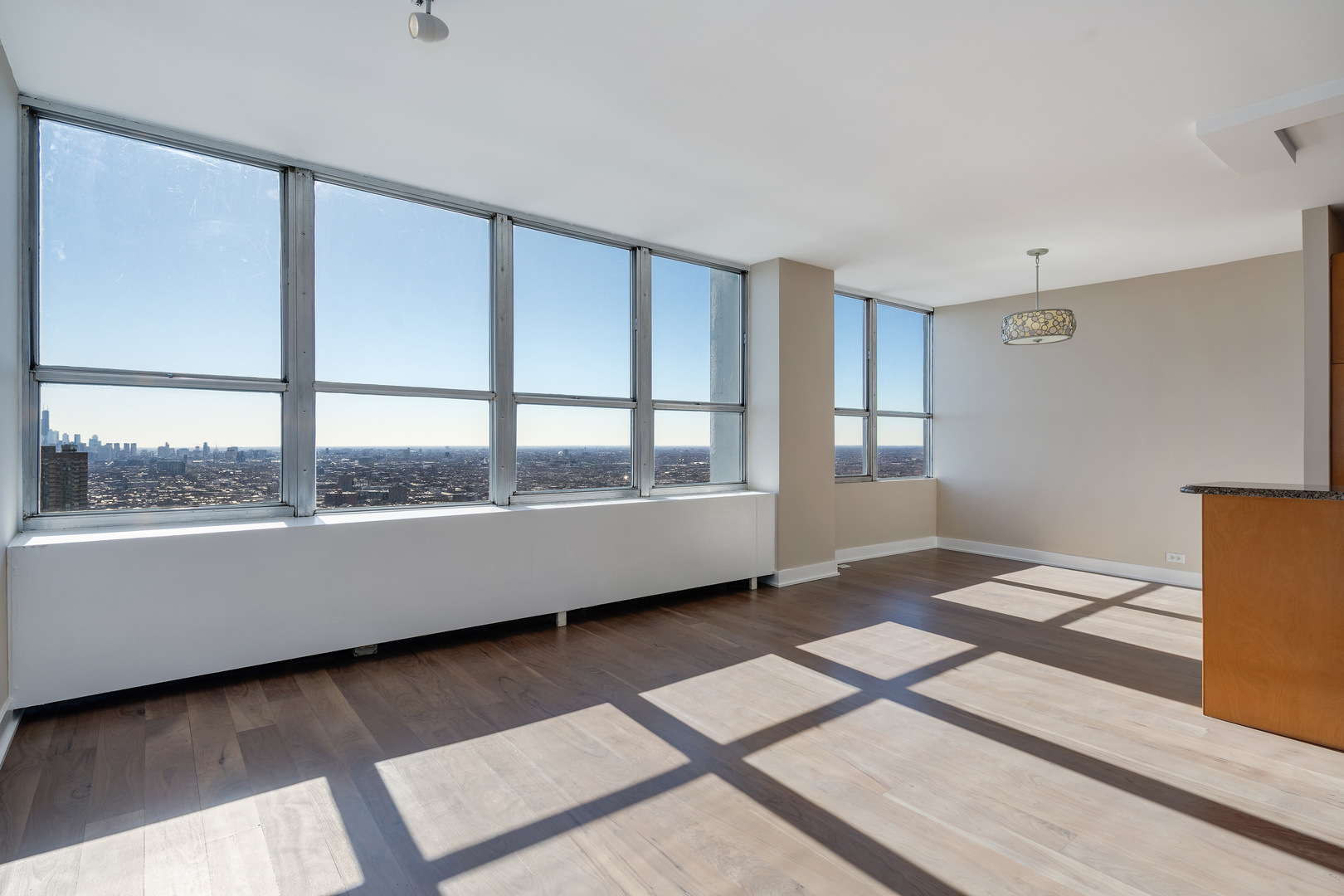 655 West Irving Park Road, Unit 5103 Chicago, IL 60613 - Photo 5 of 30 a view of an empty room with a window