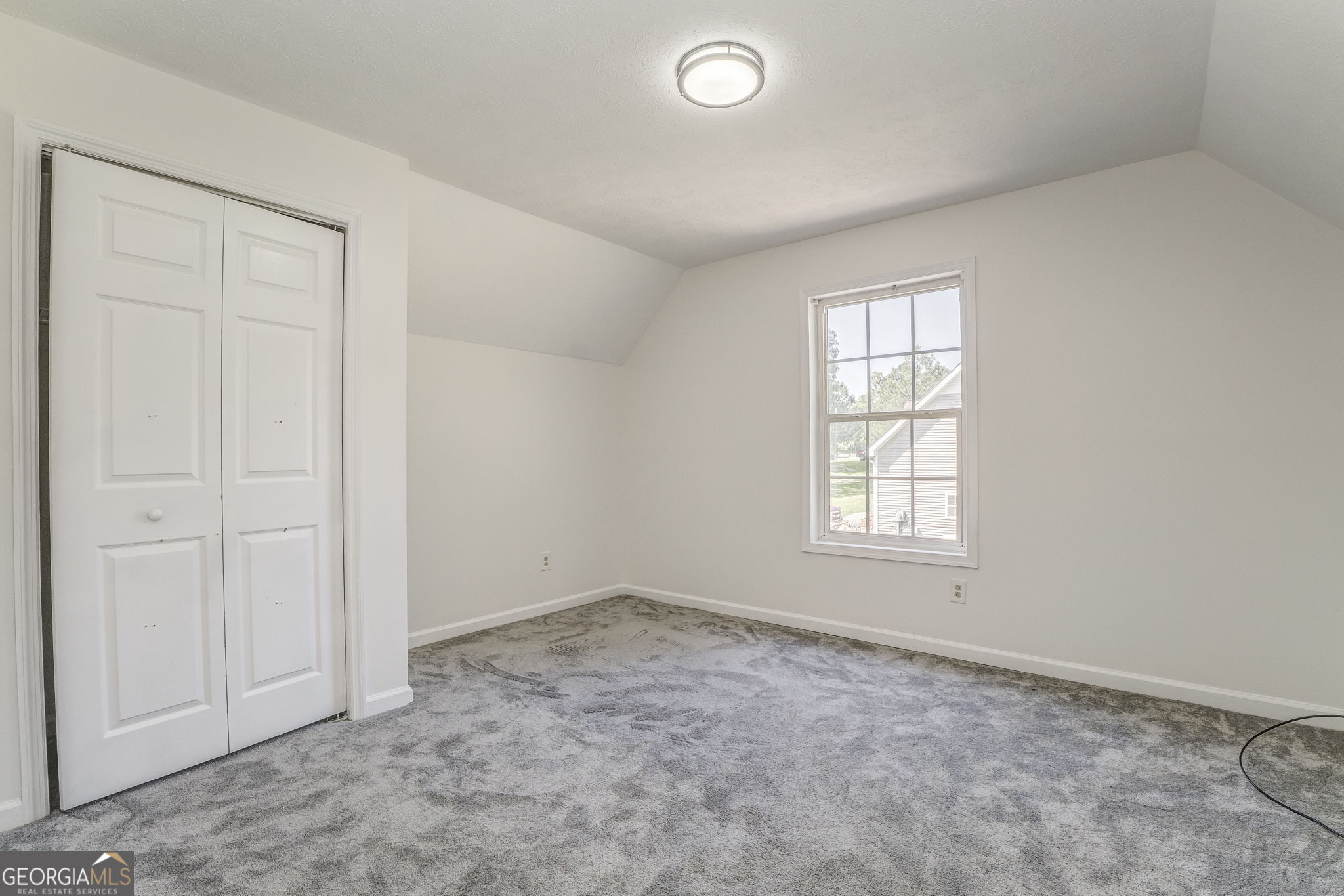 728 Hutto Road Cedartown, GA 30125 - Photo 28 of 40 an empty room with windows