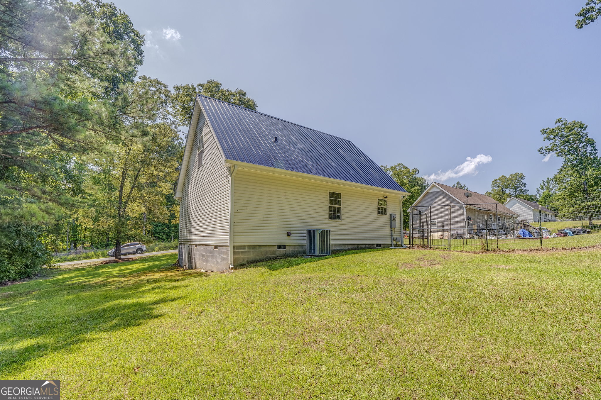 728 Hutto Road Cedartown, GA 30125 - Photo 3 of 40 a view of a house with pool and a big yard
