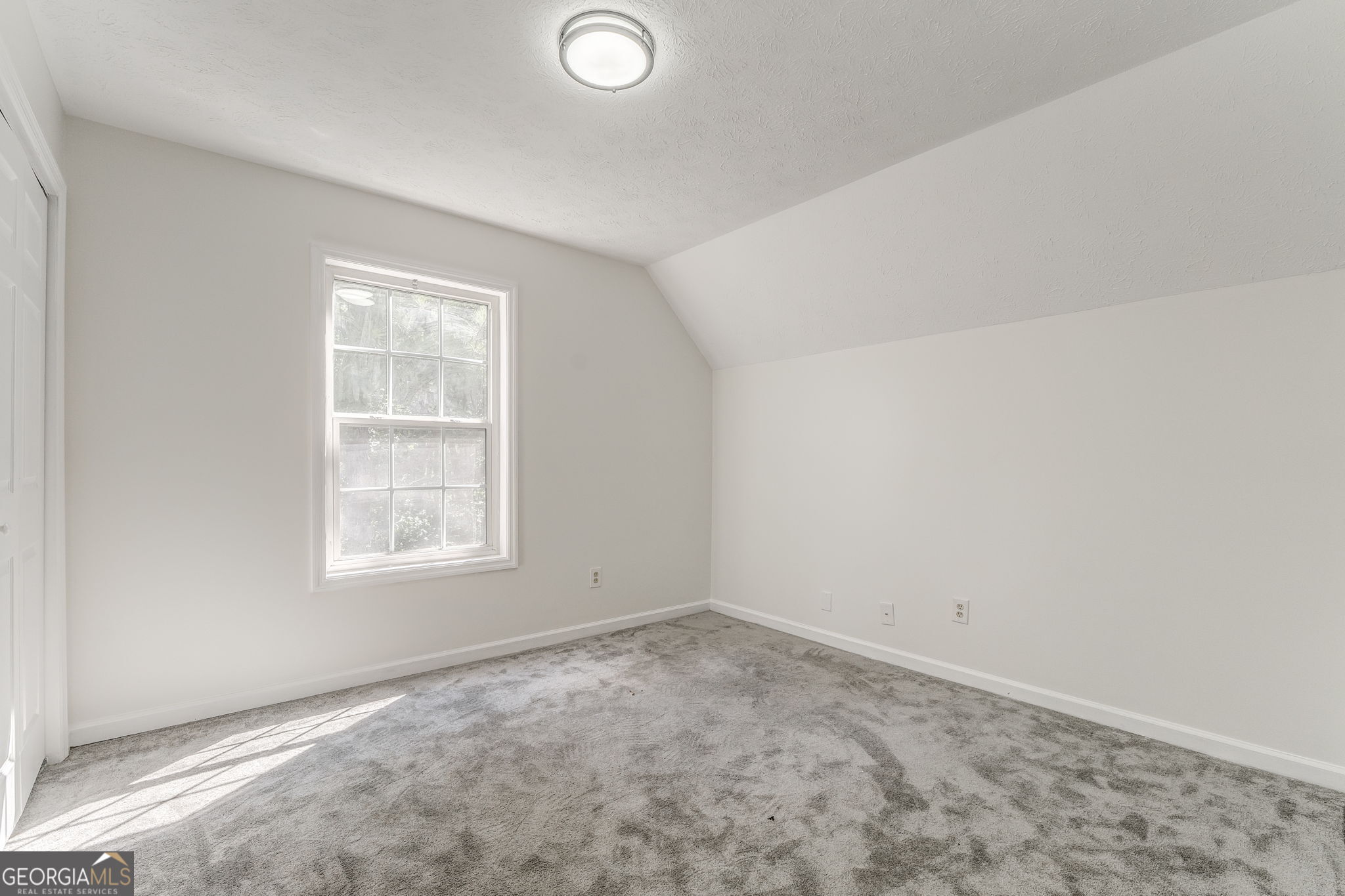 728 Hutto Road Cedartown, GA 30125 - Photo 31 of 40 an empty room with a window