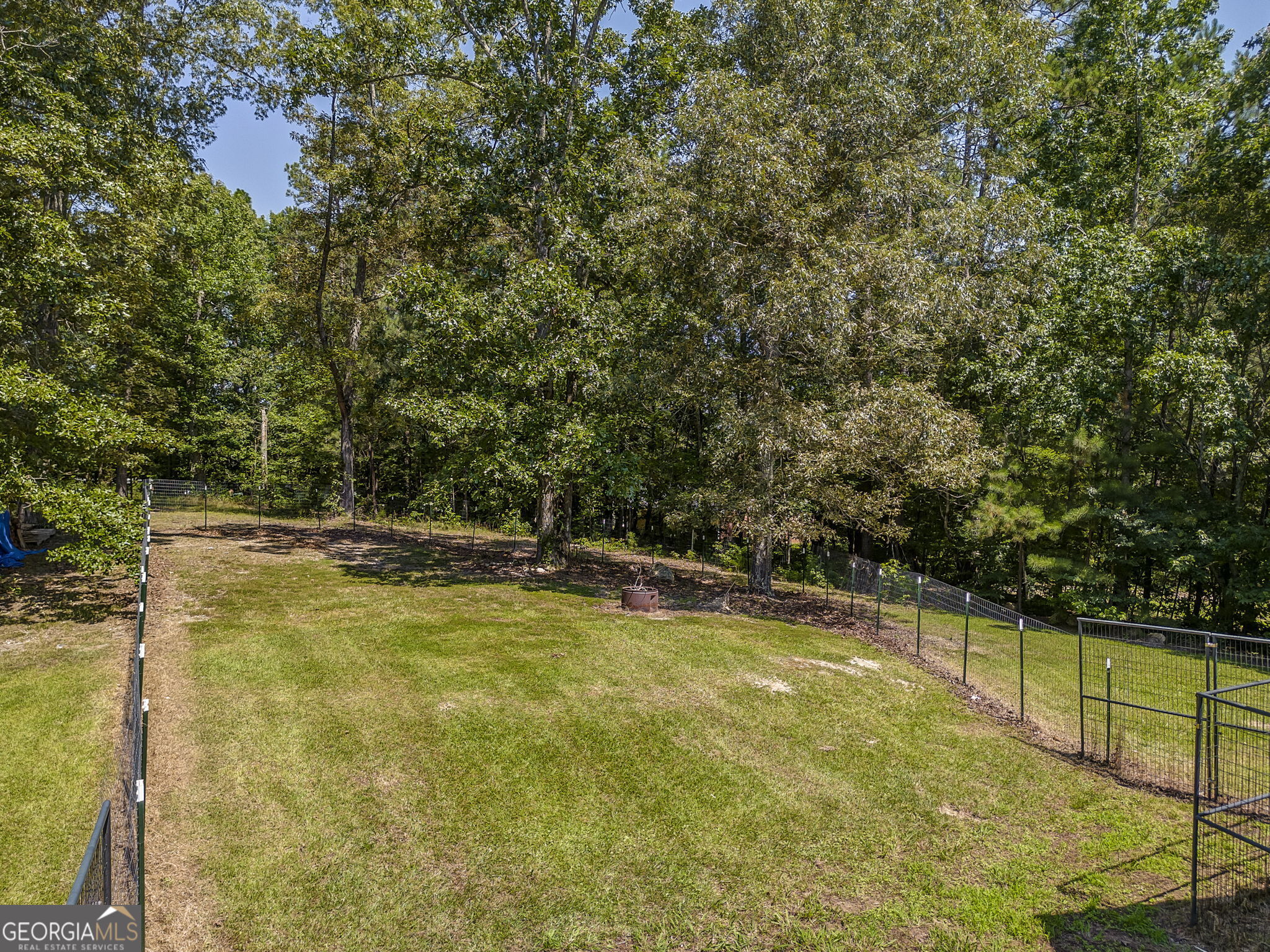 728 Hutto Road Cedartown, GA 30125 - Photo 34 of 40 a view of a swimming pool with an outdoor seating