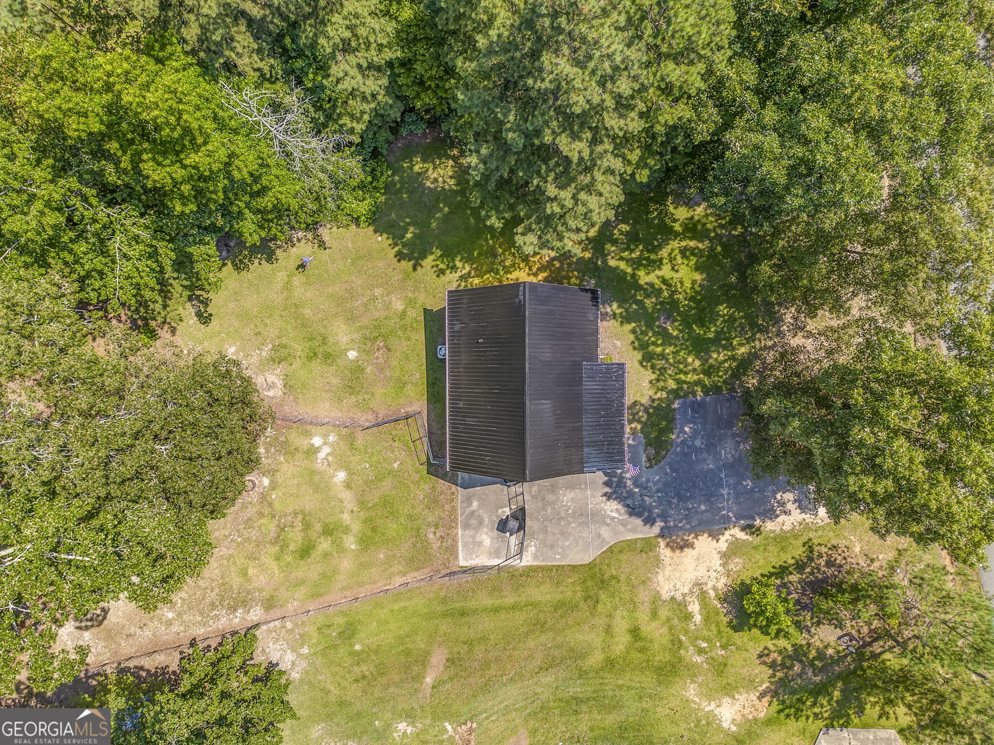 728 Hutto Road Cedartown, GA 30125 - Photo 35 of 40 a view of a garden with large trees
