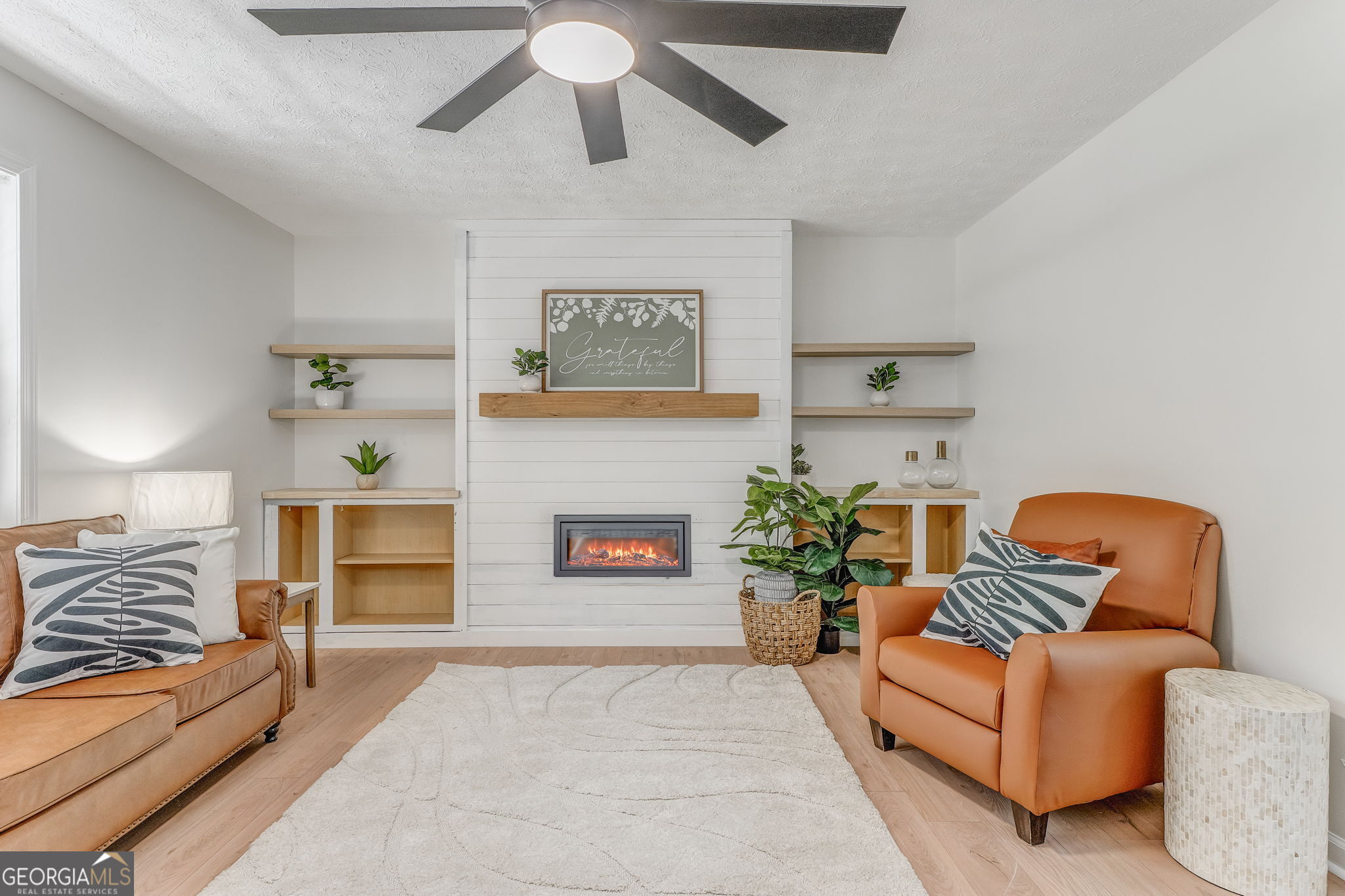 728 Hutto Road Cedartown, GA 30125 - Photo 6 of 40 a living room with furniture and a fireplace