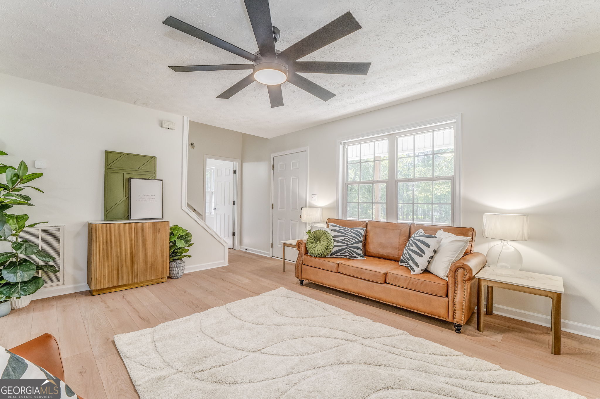 728 Hutto Road Cedartown, GA 30125 - Photo 9 of 40 a living room with furniture and a large window