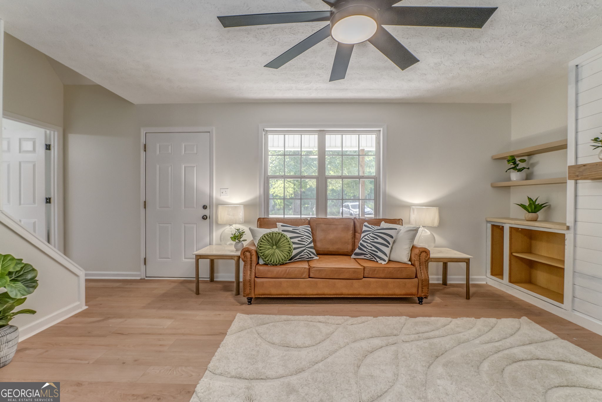 728 Hutto Road Cedartown, GA 30125 - Photo 10 of 40 a living room with furniture and a fireplace