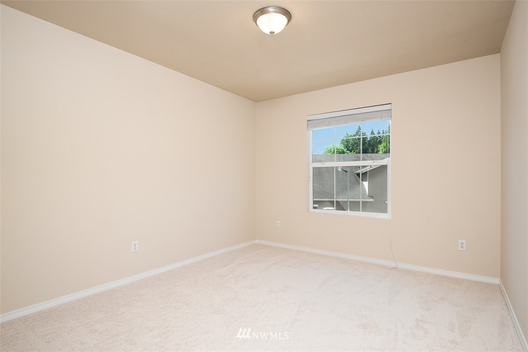 2719 232nd Street Southeast Bothell, WA 98021 - Photo 20 of 24 an empty room with a window