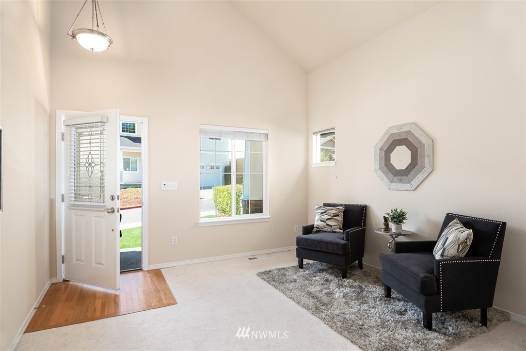 2719 232nd Street Southeast Bothell, WA 98021 - Photo 3 of 24 a living room with furniture and a window