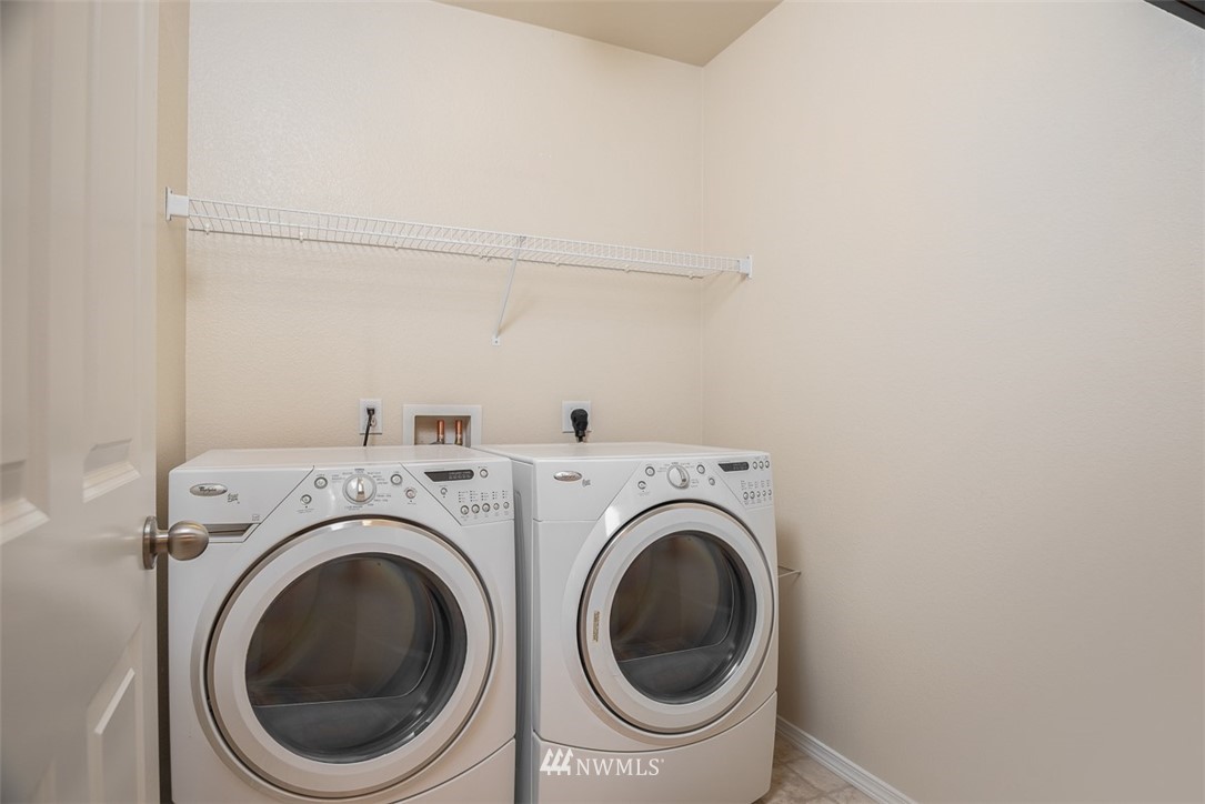 2719 232nd Street Southeast Bothell, WA 98021 - Photo 22 of 24 a utility room with dryer and washer