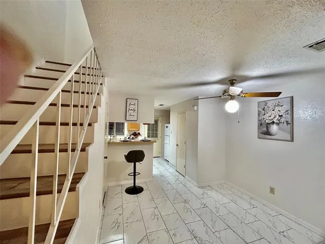 a view of entryway with a front door