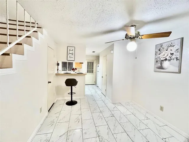 a view of a hallway with front door