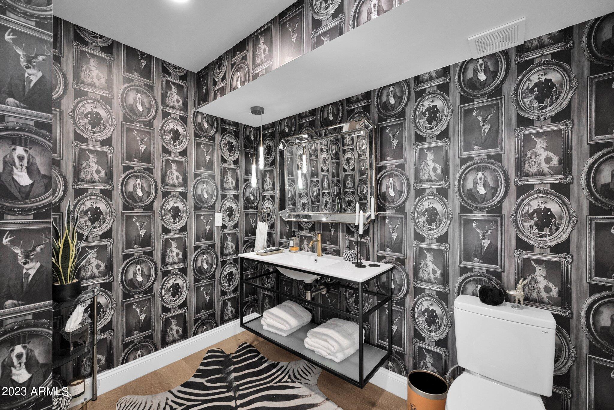 6701 North Scottsdale Road, Unit 24 Scottsdale, AZ 85250 - Photo 15 of 37 a bathroom with a sink and a mirror